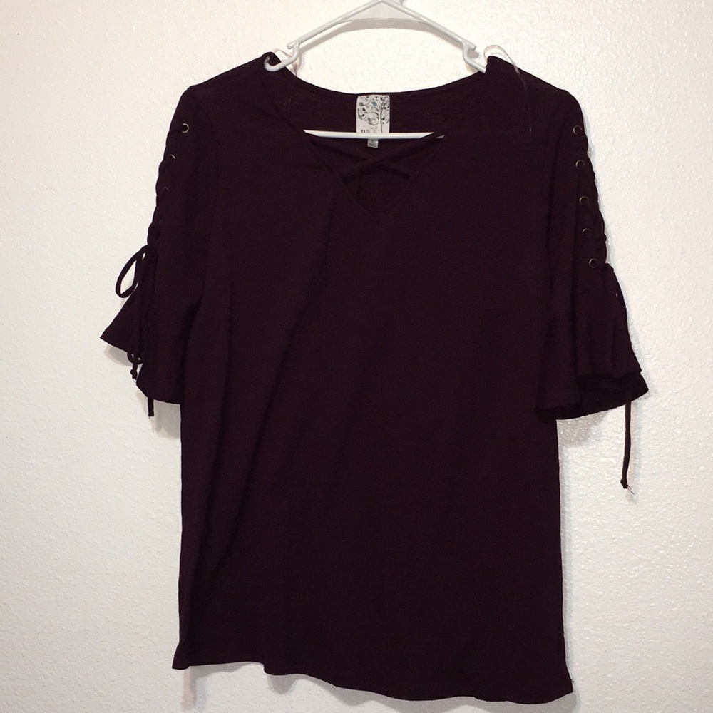 Women's large blouse by Naif